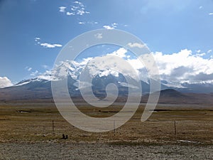 View of Muztagh Ata or Muztagata & its glaciers from the Karakoram Highway, near Tashkurgan, Xinjiang, China