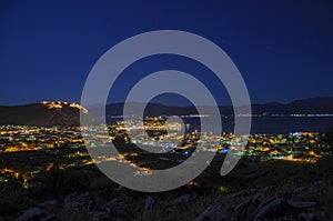 View of Nafplio town and harbour from Prophet Helias or Profitis Ilias hill at night. Argolis, Peloponnese, Greece