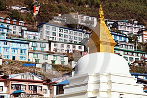 View of Namche Bazar village, building and stupa photo