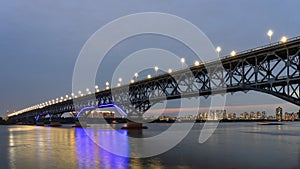 The view of the Nanjing Changjiang bridge at night is magnificent.