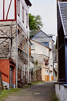 View of the narrow paved street and medieval houses