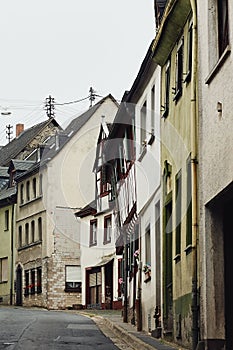 View of the narrow paved street and medieval houses