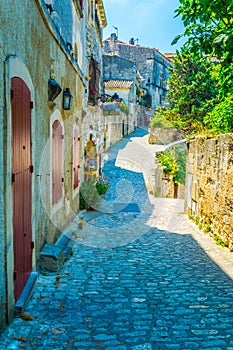 View of a narrow street in the historical center of Les Baux de Provence, France