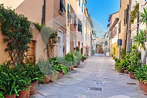 View of narrow street in Orbetello on peninsula Argentario. Tuscany. Italy