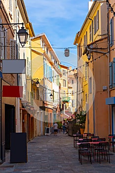 Narrow streets in French town of Hyeres in summer day photo