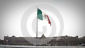 View of The National Palace of Mexico in a rainy day, the flag flutters. Is one of the most important historic buildings in Mexico