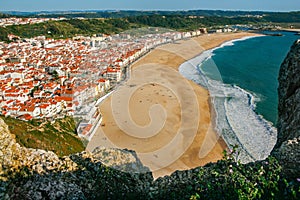 View of Nazare beach and houses from the viewpoint at the top of the cliff in O Sitio photo