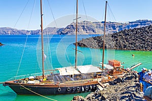 View of Nea Kameni volcanic island port Santorini Caldera Greece