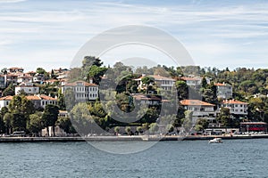 View of a neighborhood called Emirgan by Bosphorus on European side of Istanbul. It is a sunny summer day.