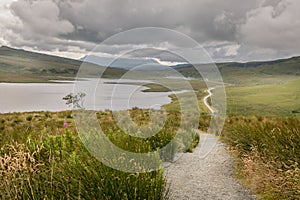 A view from the new and easier path on the Storr. Glamaig mountain in the distance shrouded in clouds