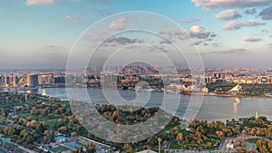 View of new modern city with green trees in luxury Dubai city, United Arab Emirates Timelapse Aerial