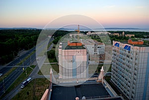View of new residential buildings in the city of Togliatti from the height of the 16th floor on an early summer morning.