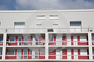 View of newly built modern block of flats under blue sky