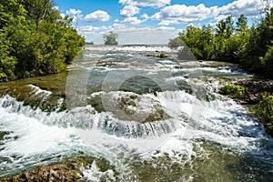 View of Niagara River at Three Sisters Island in Niagara Falls State Park in USA