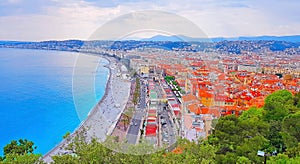 View of Nice city, Beach at sunset, Promenade des Anglais, Cote d`Azur, French riviera, France