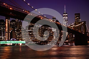 View of night scene of the Brooklyn bridge and Manhattan Skyline at Night