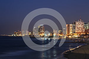 View of the night Tel Aviv and and coastal waters of the Mediterranean.