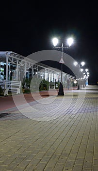 View of the night walking and cycling paths along the beach of I
