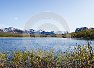 View from Nikkaloukta towards Sweden`s highest mountain range with Kebnekaise as the highest peak.