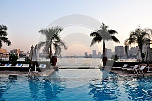 View of the Nile River from the pool and palms. Cairo, Egypt.
