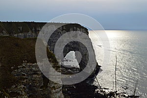 View of Normandy`s cliffs Etretat - sunset. nature, ocean, rock and sky.