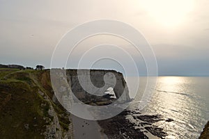 View of Normandy`s cliffs Etretat - sunset. nature, ocean, rock and sky.