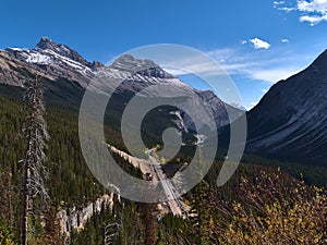 View of North Saskatchewan River Valley with rugged Cirrus Mountain and Icefields Parkway in Banff National Park, Canada.