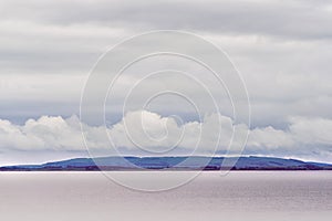 View of the North Sea and a shore under a cloudy sky in Caithness county