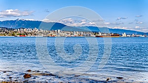 View of the North Shore of Vancouver Harbor viewed from the Stanley Park Seawall in B,C, Canada