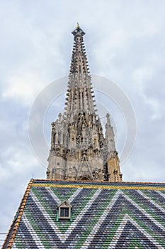 View of the north tower of St. Stephen`s Cathedral with the cathedral`s famous ornately patterned roof