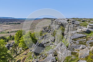 A view northward along the millstone cap on the highest point on the top of the Stanage Edge escarpment in the Peak District, UK