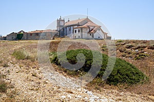 The view of Nossa Senhora do Cabo Church on the cape Espichel in Sesimbra, Portugal