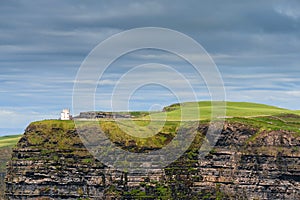 View O`Briens tower on Cliff of Moher, county Clare, Ireland. Epic landscape with magnificent scenery. Irish landmark and popular