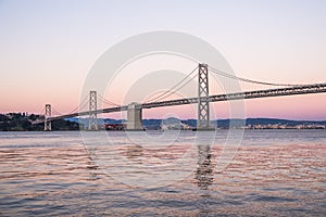 View of the Oakland Bay Bridge on a clear sunny day, San Francisco, California