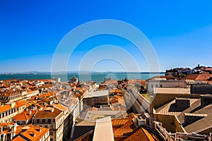 View from observation deck of the Elevador de Santa Justa to the old part of Lisbon. Cityscape with the Lisbon rooftops