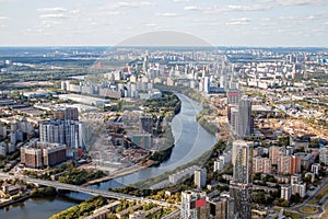 The view from the observation deck. Top view of the Moscow river. Summer in the city, sky and clouds. Sunny day, new construction