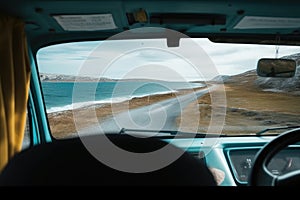 View of the ocean from the interior of the minivan. Generative ai