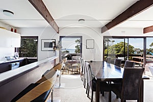 View of the ocean from retro beach house dining room photo