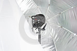 View into an octabox reflector with the flashlight in the middle