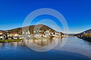 View on Odenwald forest called `Heiligenber` with historical mansions and neckar river in city Heidelberg in Germany, view from Th