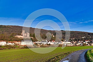 View on Odenwalf forest with buildings and well preserved and inhabited medieval German hill castle called `Mittelburg`