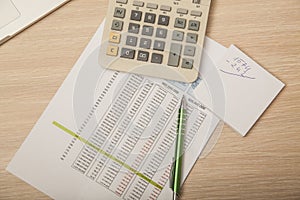 View of the office desk, calculations and notes, top view