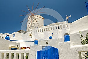 View of oia in santorini with an old mill