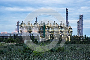 View of oil and gas refinery industry plant at twilight time