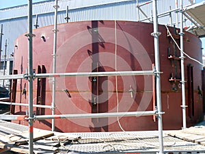 View of the oil storage tank assembly. Storage tanks pressure vessels are containers that hold liquids, compressed gases.