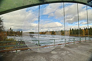 View from old bridge crossing Pite river at Ljusselforsen in Lapland