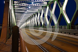 View of the old bridge over the Danube river in Bratislava at night