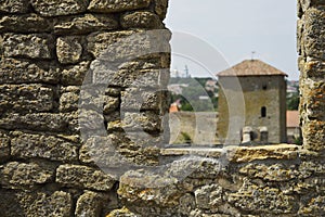 View of the old building through the loophole of the defensive wall of the Akkerman fortress, Ukraine