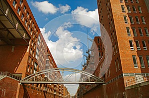 View of old buildings and bridges in HafenCity, historic downtown in Hamburg, Germany, summer