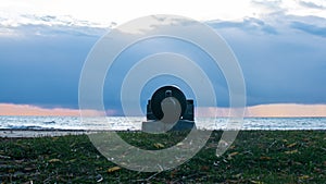 View of an old cannon on the shore as a landmark during synset